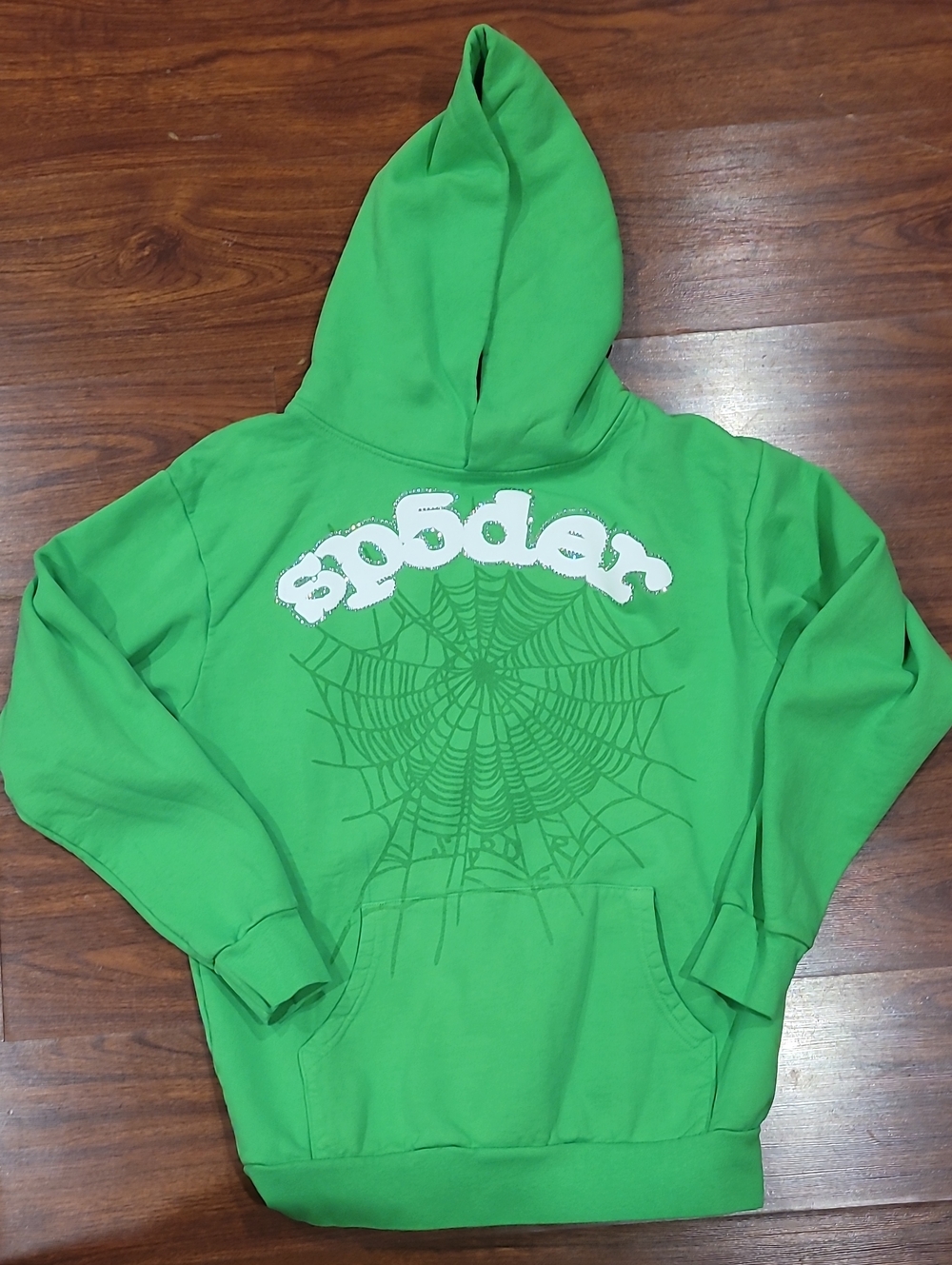 Green Hoodie with Spiderweb Graphic